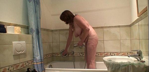  Busty mother inlaw rides his cock after shower